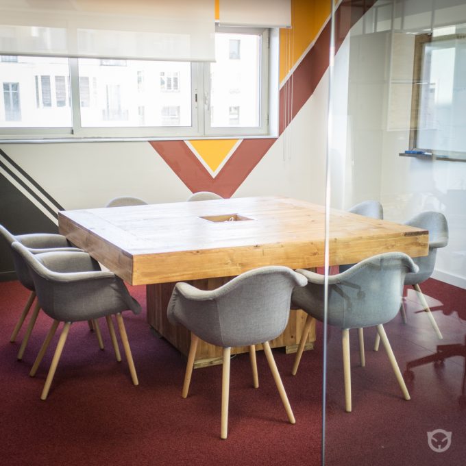 custom table and wall painting by Ally for office TravelPerk